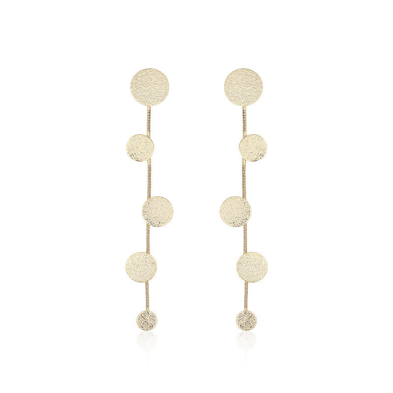 Exaggerated metal disc earrings women long