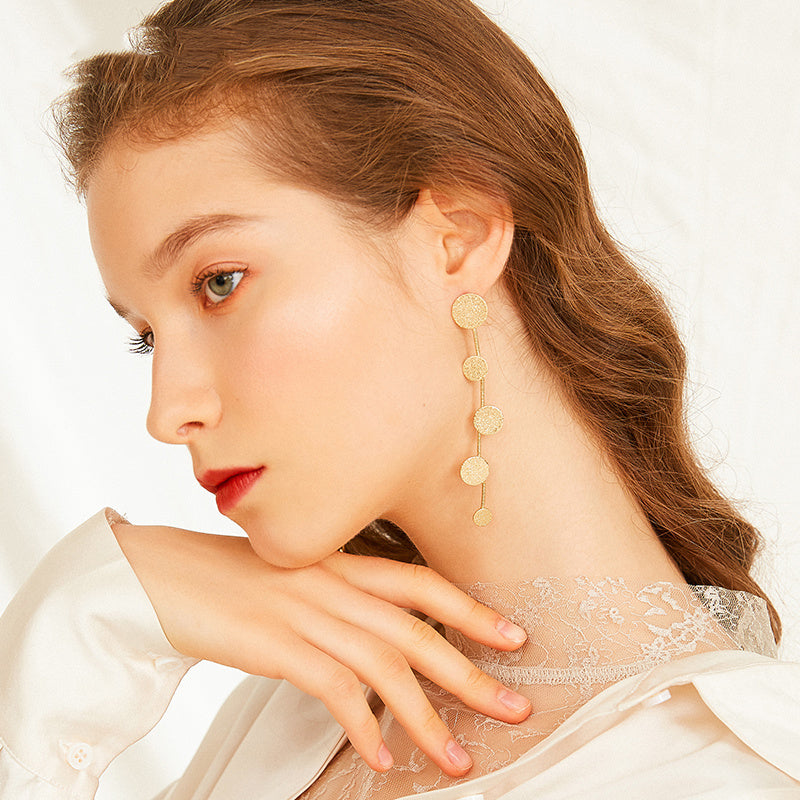 Exaggerated metal disc earrings women long