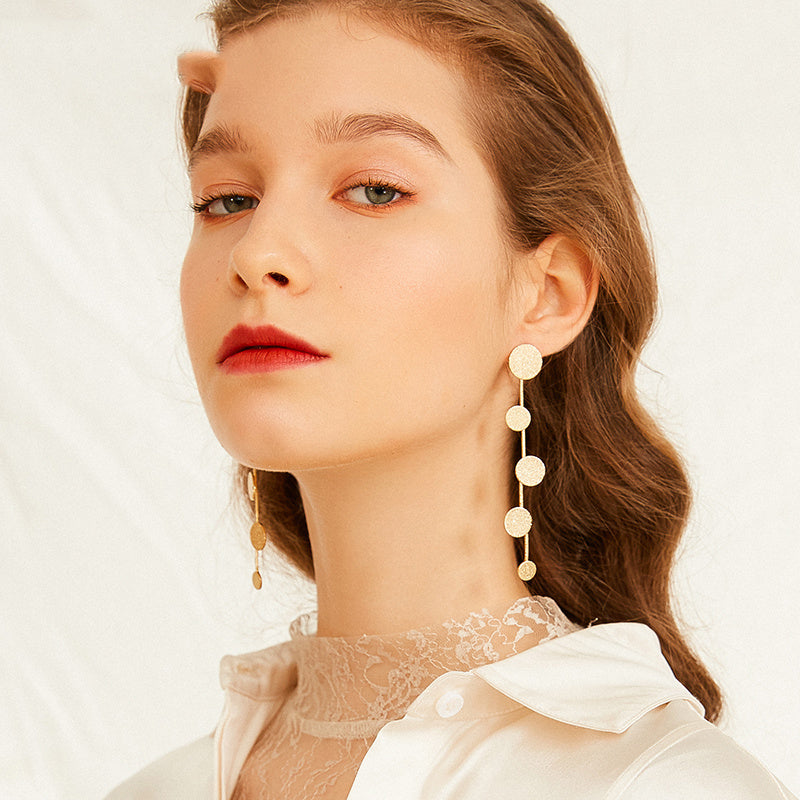 Exaggerated metal disc earrings women long